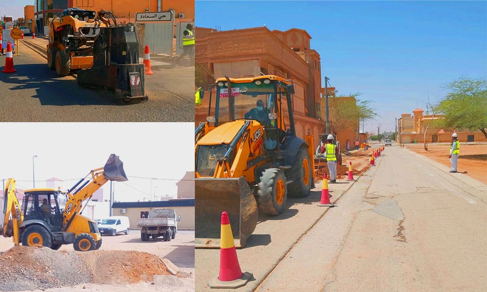 معدات وفرق شركة هدالين أثناء أعمال الحفر وتمديد مسارات الكابلات وتأمين موقع العمل في أحد الشوارع